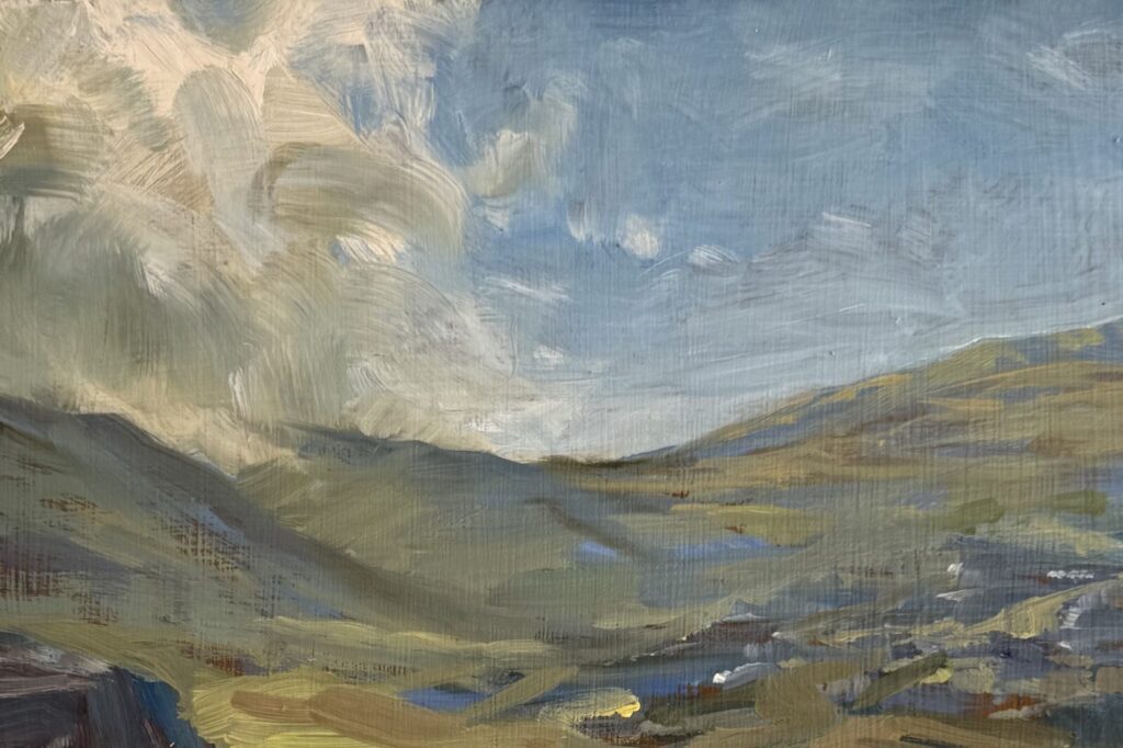 Detail of an oil painting on board of a landscape in the mountains, with rocks in the foreground and sunlit clouds in the background